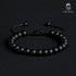 Elegantes Onyx Armband mit matten Perlen auf dunklem Hintergrund – luxuriöses Schmuckstück mit zeitlosem Charakter uniqal